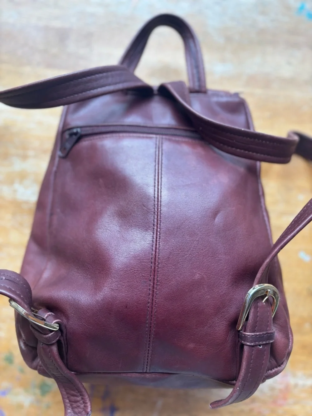 Tiganello Smooth Leather Backpack in Dark Brown with Gold Accent